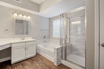 Bathroom with tub and shower